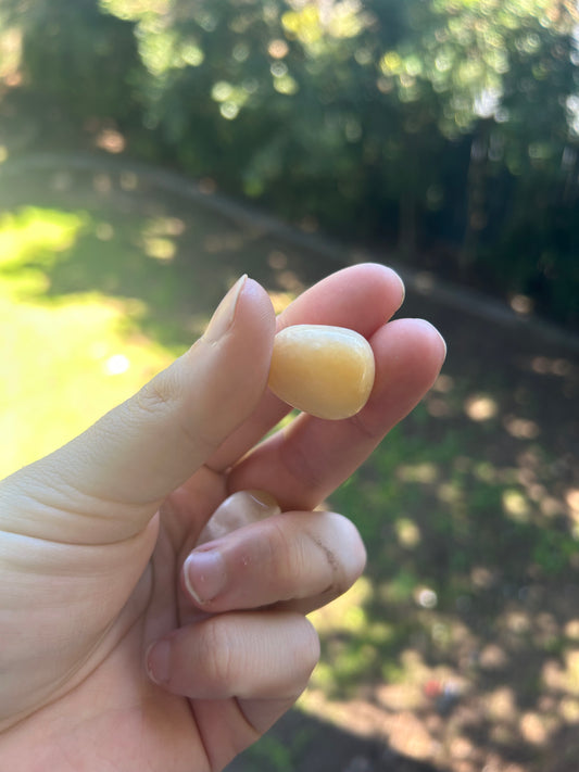 Orange calcite tumble
