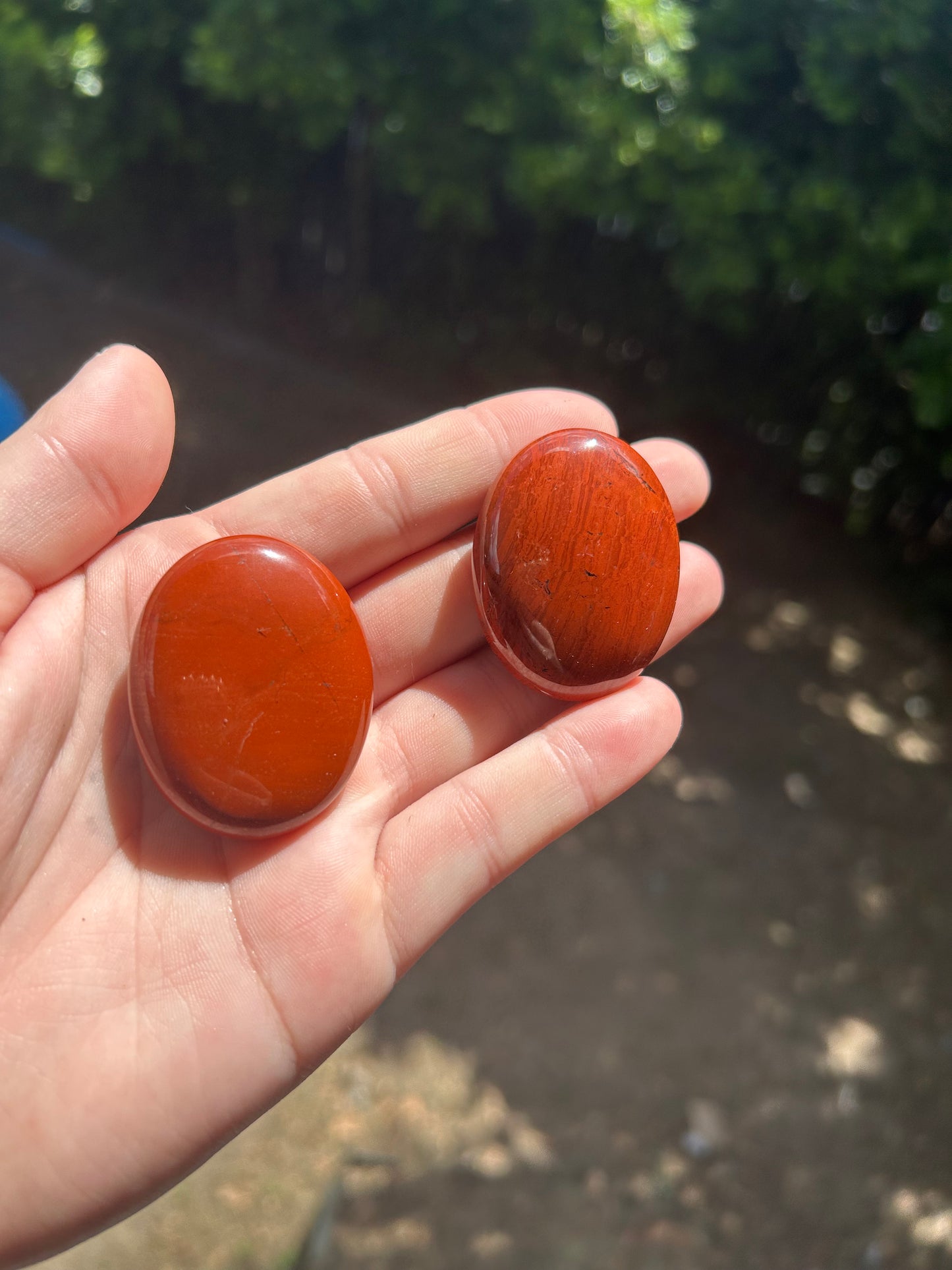 Red jasper palm stone